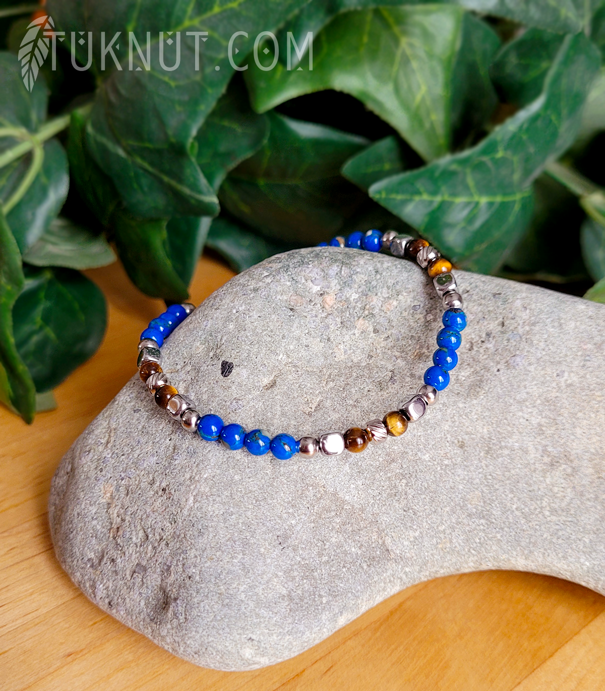 Bracelet d'inspiration autochtone en acier inoxydable avec turquoise et oeil de tigre (couleurs : argent, bleu et brun) TUKNUT