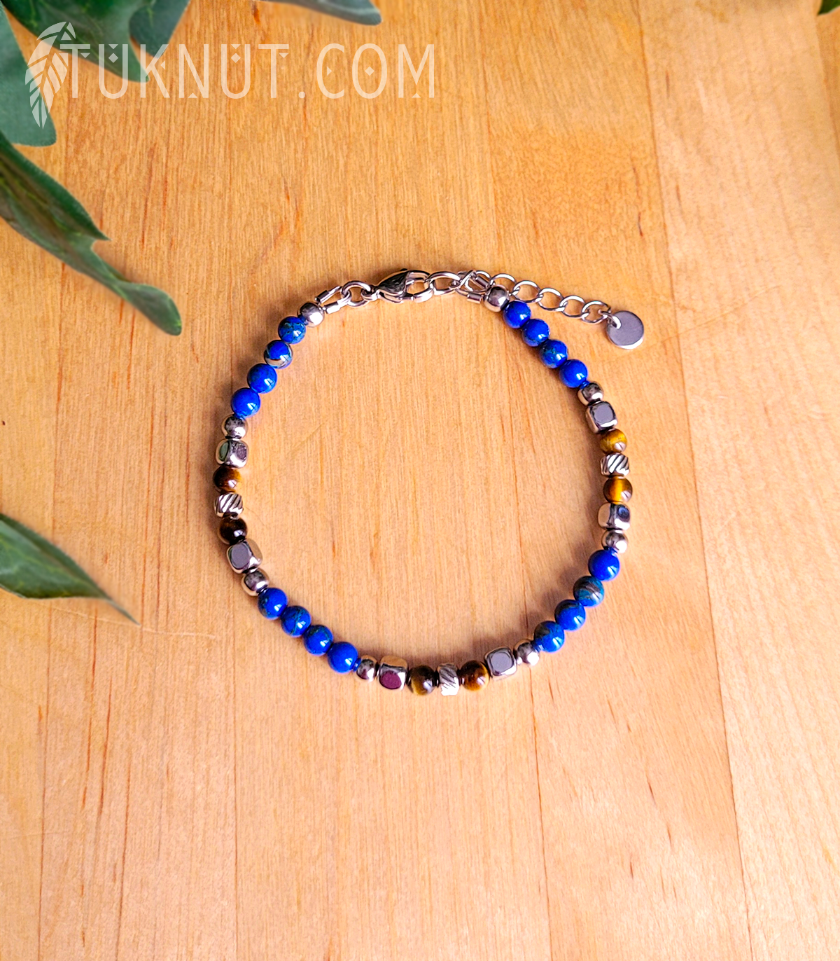 Bracelet d'inspiration autochtone en acier inoxydable avec turquoise et oeil de tigre (couleurs : argent, bleu et brun) TUKNUT