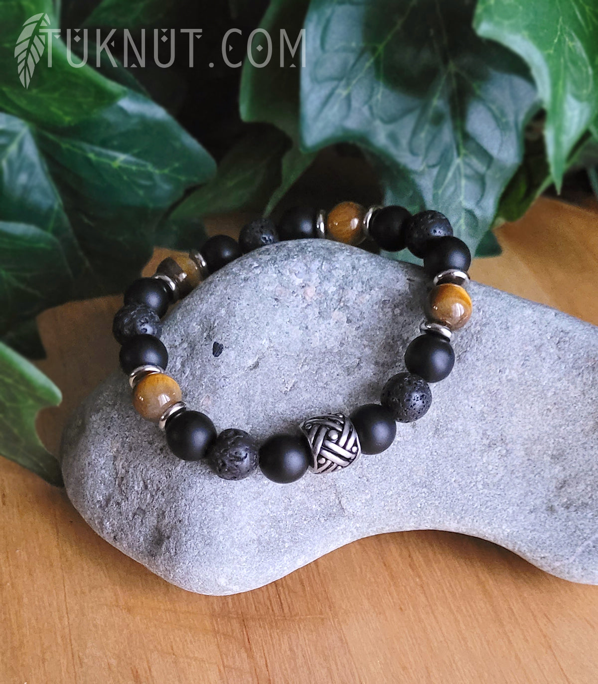 Bracelet extensible d'inspiration autochtone; avec acier inoxydable, onyx, pierre volcanique et oeil de tigre (couleurs : noir, brun et argent) TUKNUT