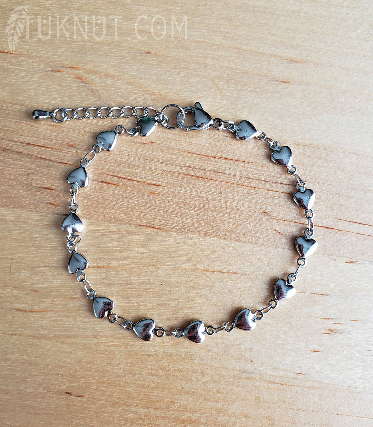 Bracelet en acier inoxydable avec petits coeurs (couleur : argent) TUKNUT