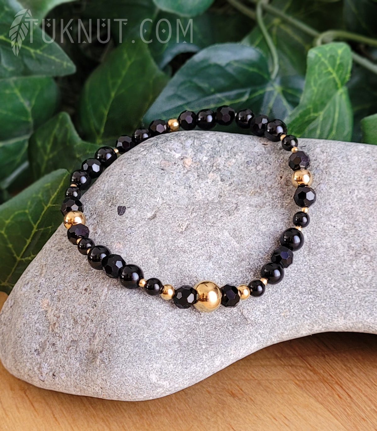 Bracelet extensible avec onyx, cristal et acier inoxydable (couleurs : noir et or) TUKNUT