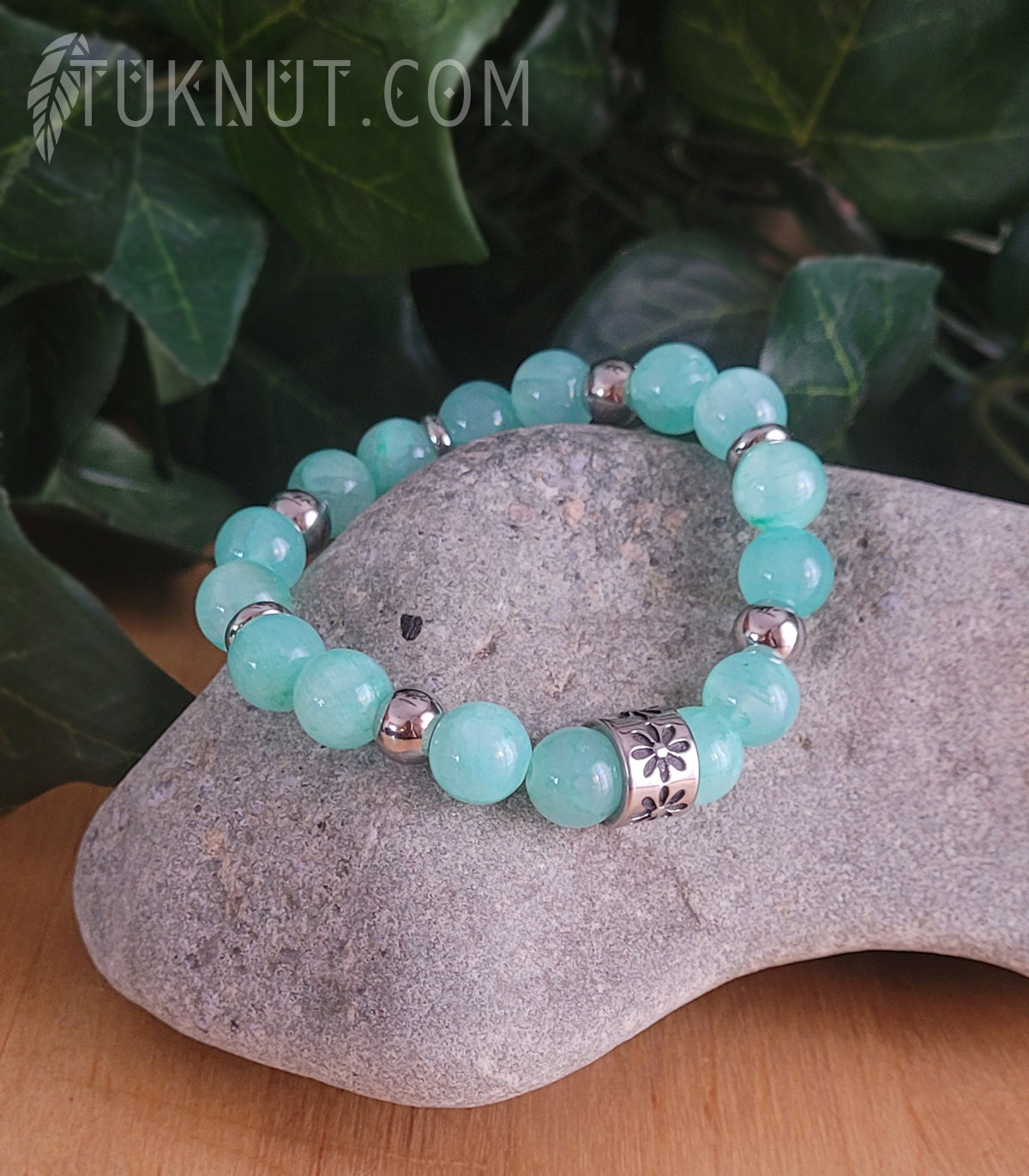 Bracelet extensible avec jade et acier inoxydable (bille en Inox avec marguerite) (couleurs : turquoise et argent) TUKNUT