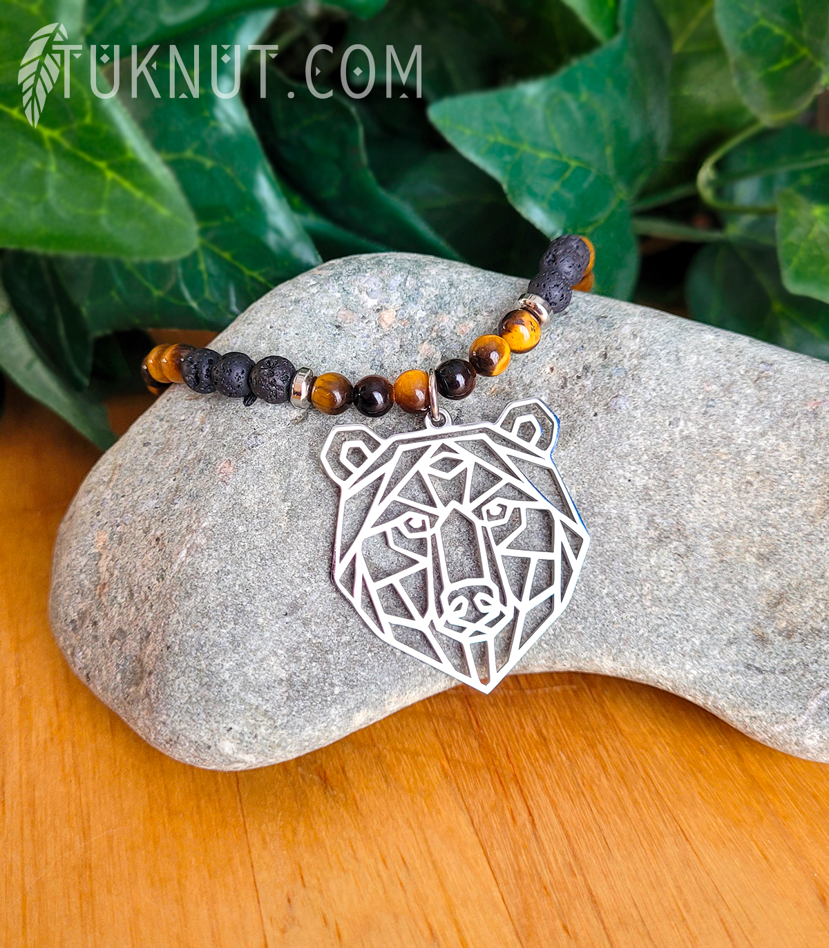 Collier d'inspiration autochtone avec pendentif (ours) en acier inoxydable avec pierre volcanique et oeil de tigre (couleurs : noir, brun et argent) TUKNUT