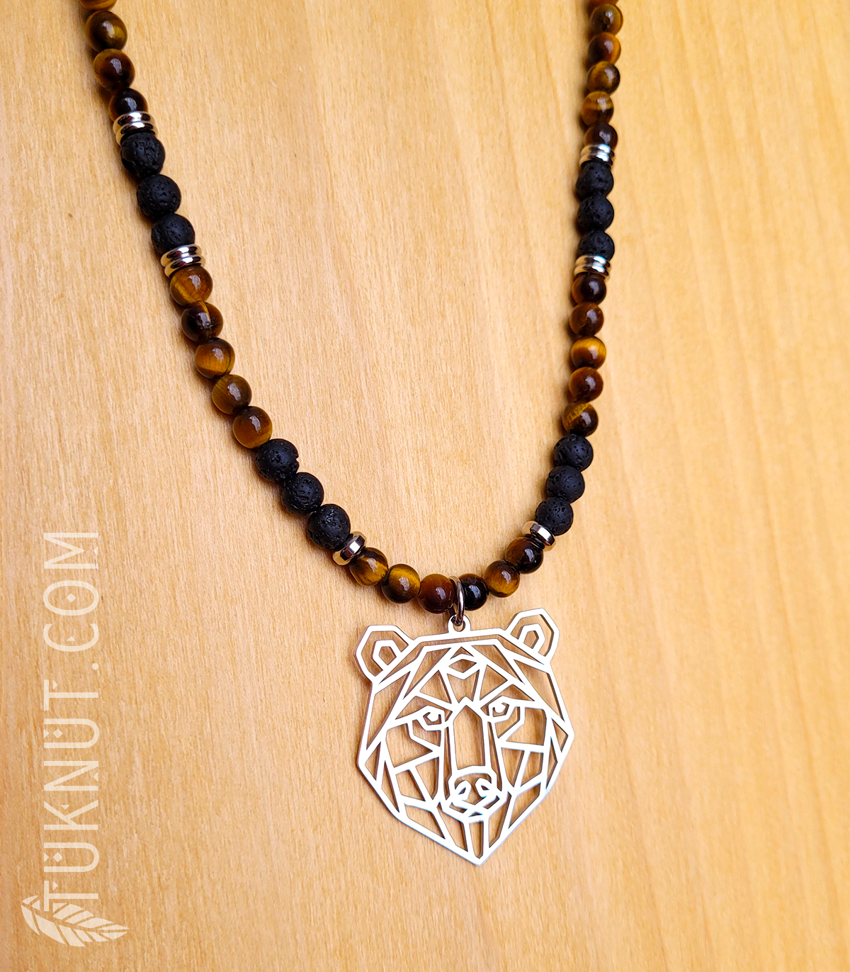 Collier d'inspiration autochtone avec pendentif (ours) en acier inoxydable avec pierre volcanique et oeil de tigre (couleurs : noir, brun et argent) TUKNUT