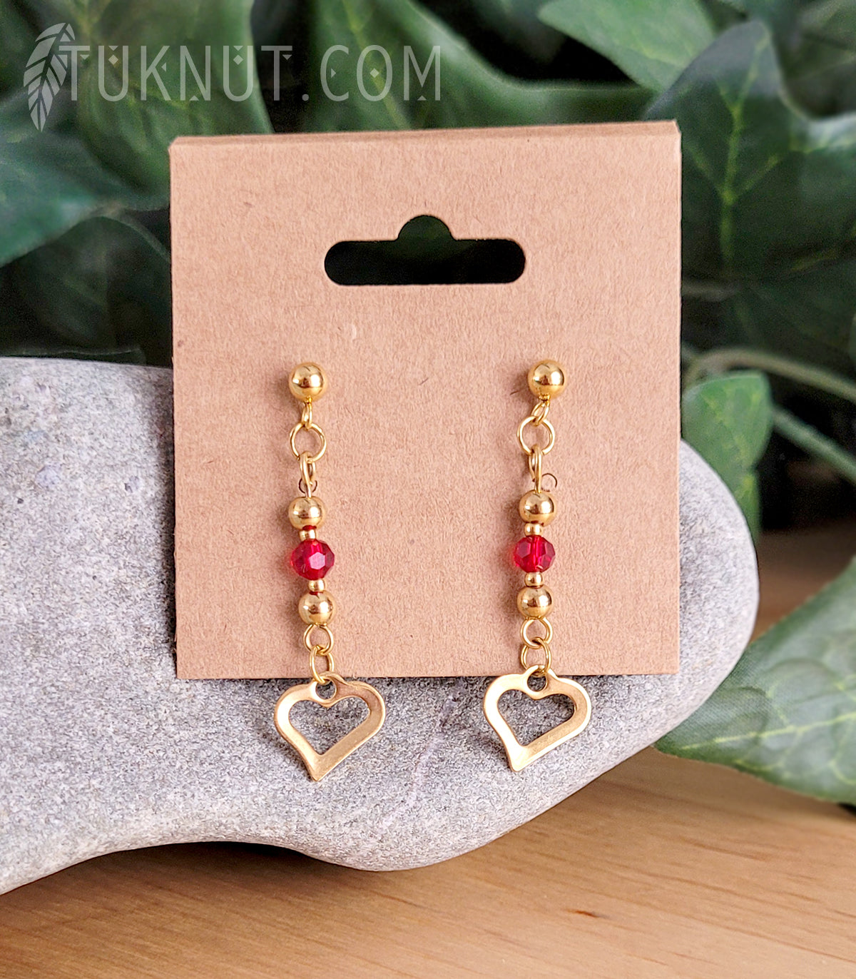 Boucles d'oreilles (tiges et papillons) avec pendentifs (coeur) en acier inoxydable et cristal (couleurs : or et rouge) TUKNUT