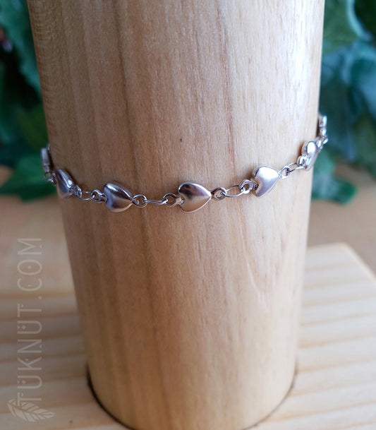 Bracelet en acier inoxydable avec petits coeurs (couleur : argent) TUKNUT