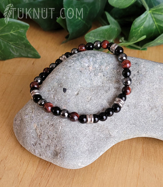 Bracelet extensible avec onyx, oeil de tigre rouge, hématite et acier inoxydable (couleurs : noir, brun/rouge, gris foncé et argent) TUKNUT