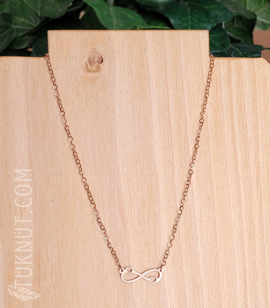 Collier en acier inoxydable avec symbole infini et petits coeurs (couleur : or rose) TUKNUT