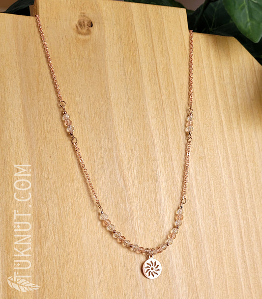 Collier d'inspiration autochtone avec pendentif (soleil) en acier inoxydable avec cristal (couleurs : rose, translucide et or rose) TUKNUT